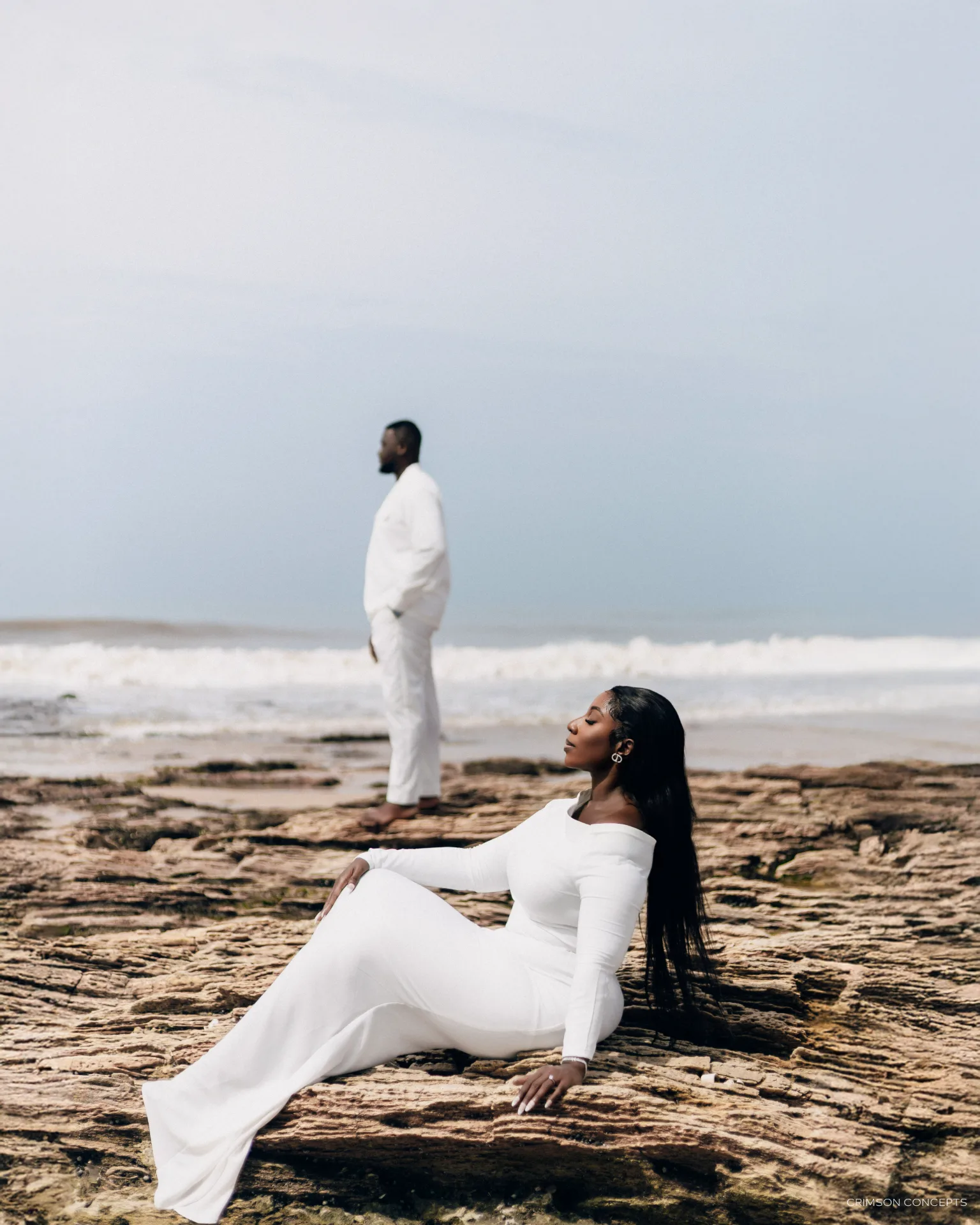 Couple photography by Crimson Concepts, Accra Ghana — coastal rocks editorial portrait