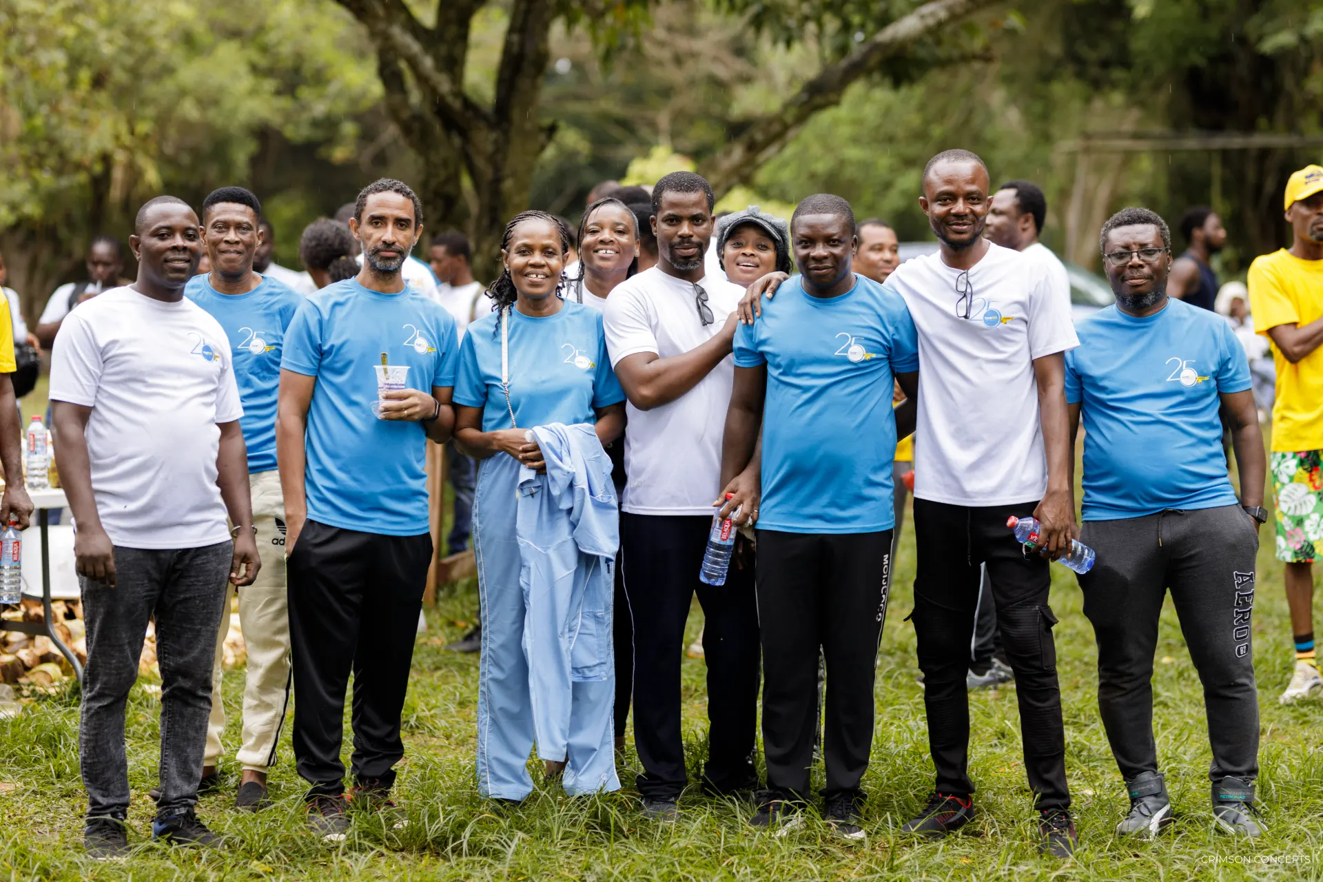 Event photography by Crimson Concepts, Accra Ghana — group photo, outdoor community event StarOil