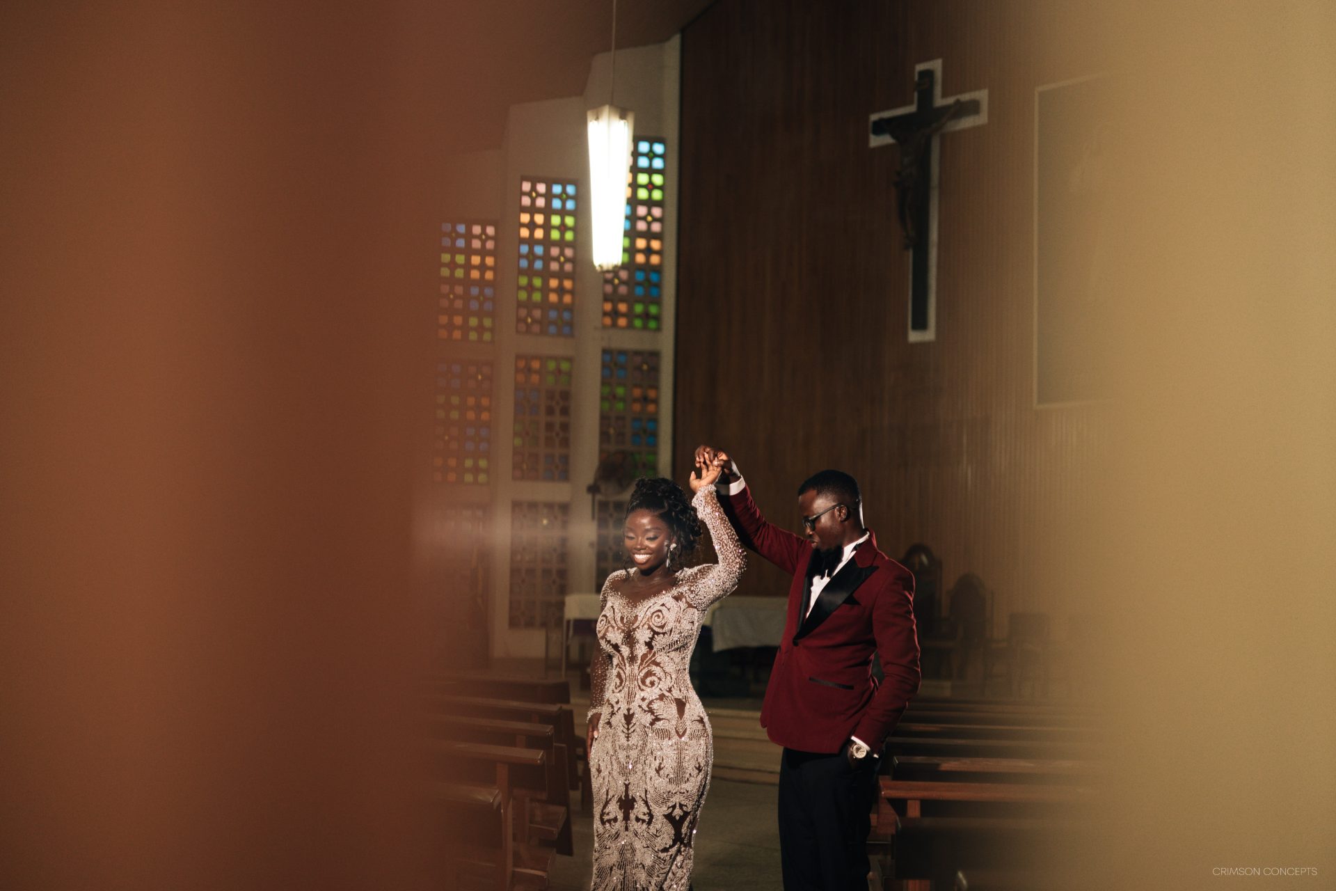Wedding photography by Crimson Concepts, Accra Ghana — church aisle dance