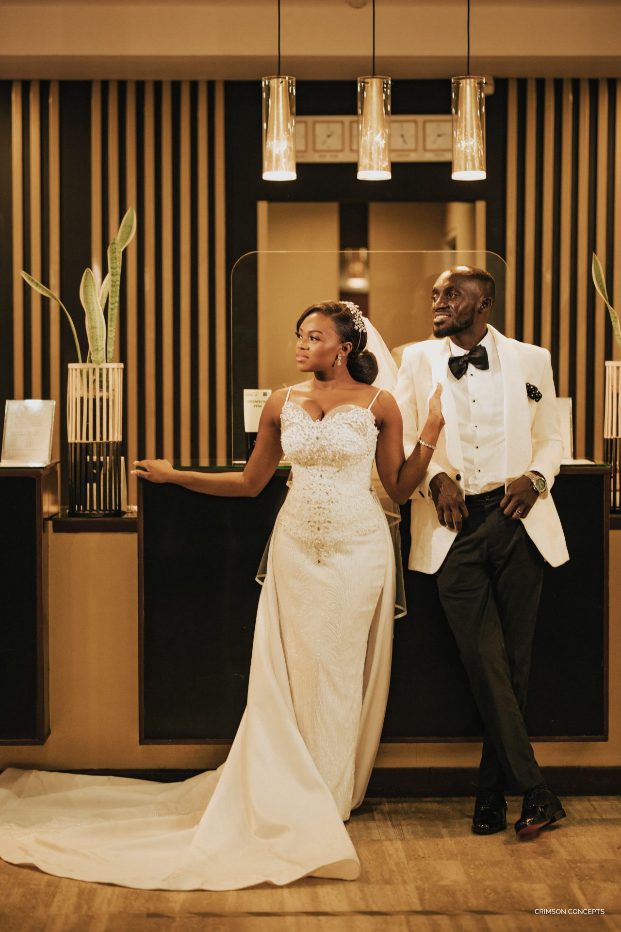 Wedding photography by Crimson Concepts, Accra Ghana — bride and groom at hotel reception